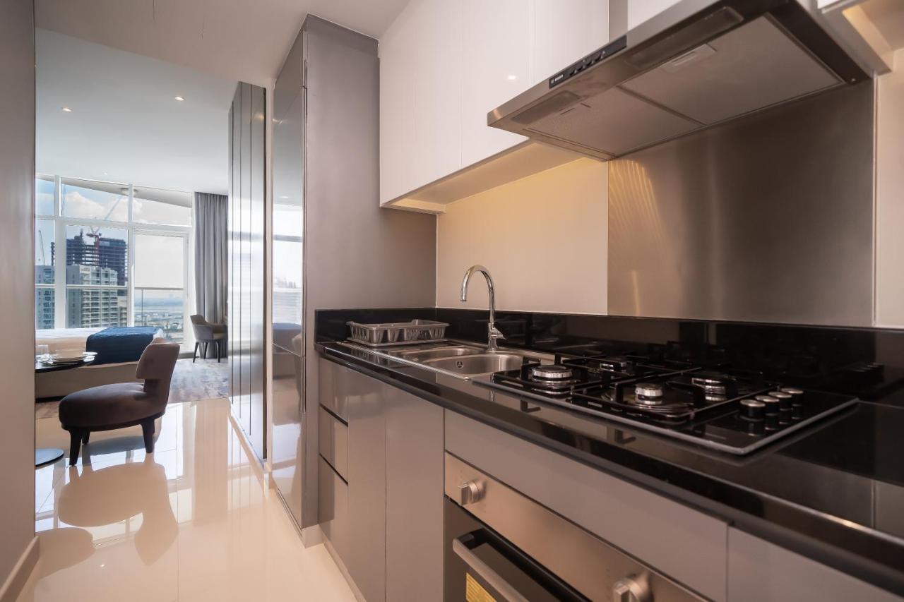 Luton Vacation Homes - Damac Maison Prive Studio, Canal View, Dubai - 16Ab03 Bagian luar foto